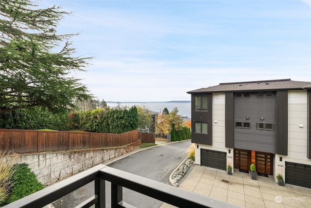 view of patio featuring a water view