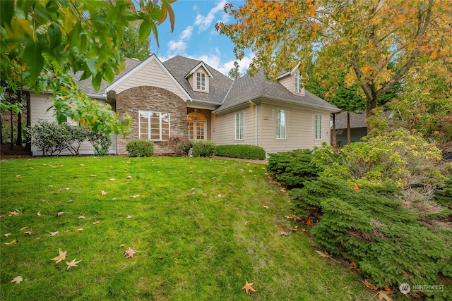 view of front of home with a front yard