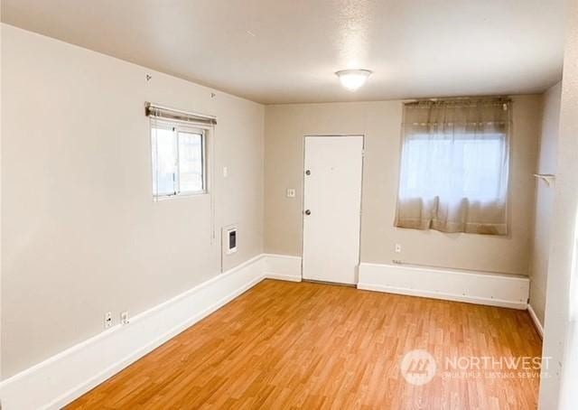 5503 112th St SW, Lakewood, WA 98499 - unfurnished room with light wood finished floors and baseboards