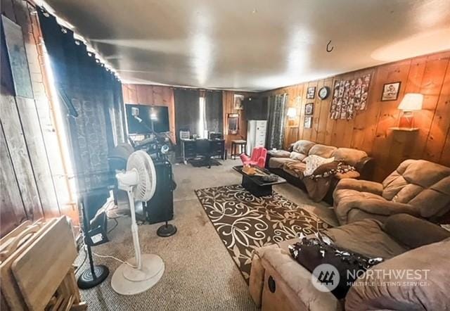 5503 112th St SW, Lakewood, WA 98499 - carpeted living room featuring wood walls
