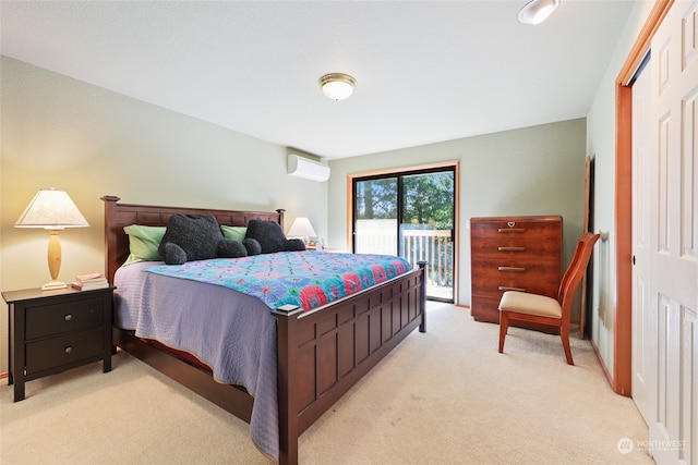 bedroom with a wall mounted air conditioner, light carpet, access to exterior, and a closet