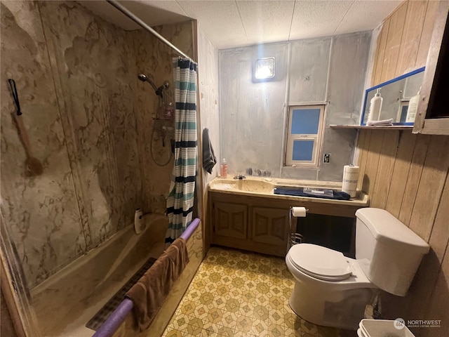 bathroom with toilet, shower / bath combo with shower curtain, a textured ceiling, and wooden walls