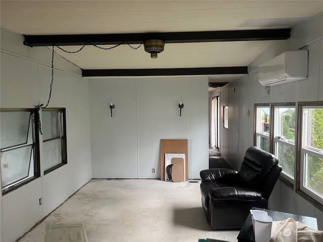 sitting room featuring lofted ceiling with beams and a wall mounted air conditioner