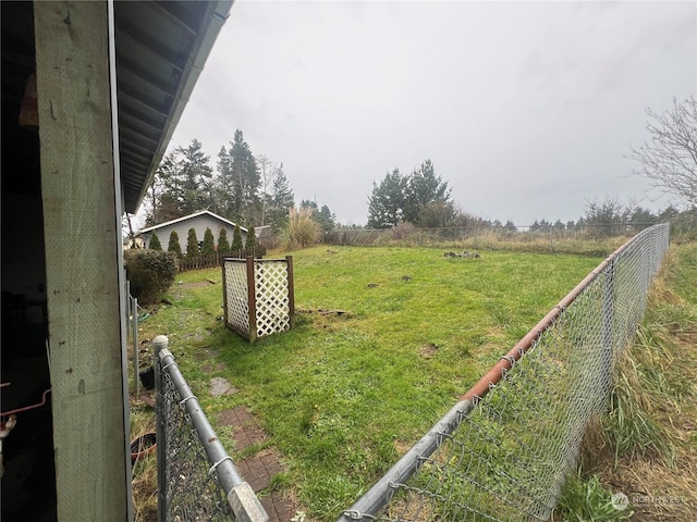 view of yard with a rural view