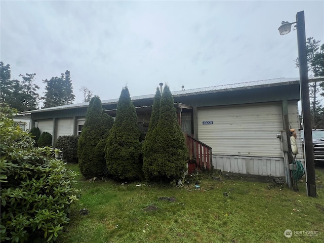 view of property exterior featuring a garage