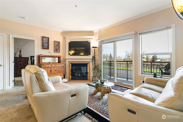 carpeted living room featuring a fireplace and crown molding