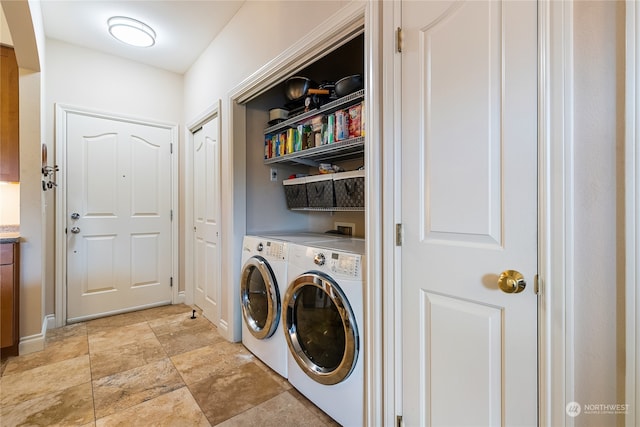 laundry area featuring washer and clothes dryer