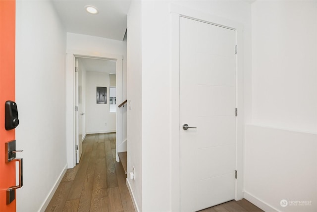 corridor featuring wood-type flooring