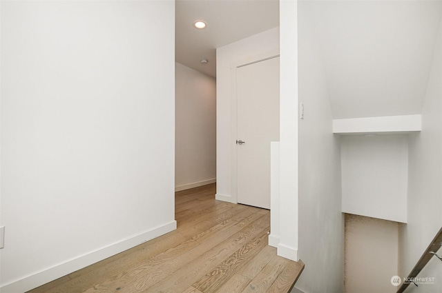 hallway with light wood-type flooring