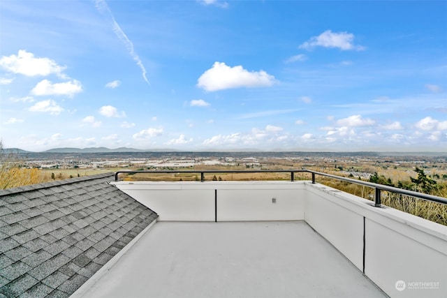 view of patio / terrace with a mountain view