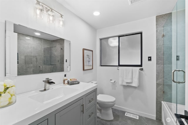 bathroom featuring vanity, toilet, and walk in shower