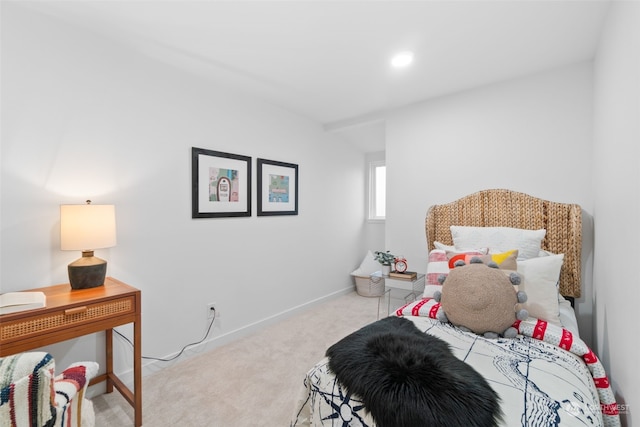 bedroom with light carpet