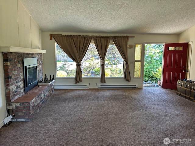 450 Spruce St, Friday Harbor, WA 98250 - unfurnished living room with a textured ceiling, a baseboard radiator, carpet, and plenty of natural light