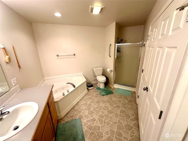 full bathroom featuring vanity, plus walk in shower, and toilet