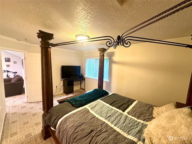 carpeted bedroom featuring crown molding and a textured ceiling