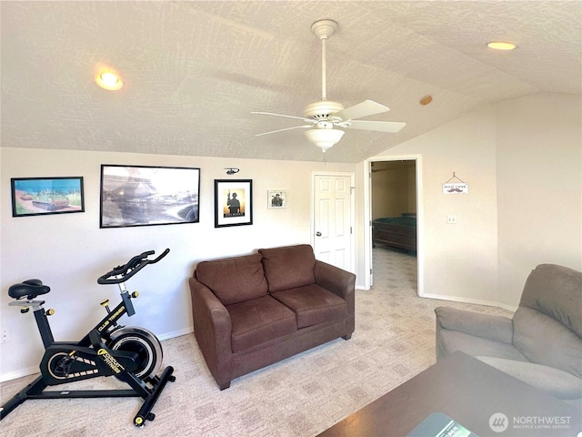 146 28th St NW, Long Beach, WA 98631 - living area featuring vaulted ceiling, baseboards, ceiling fan, light colored carpet, and recessed lighting