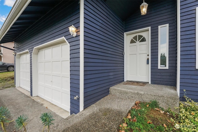 entrance to property with a garage