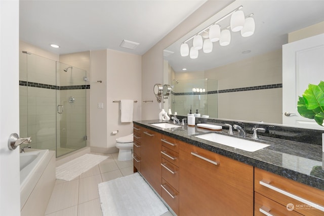 full bathroom with tile patterned flooring, vanity, toilet, and plus walk in shower