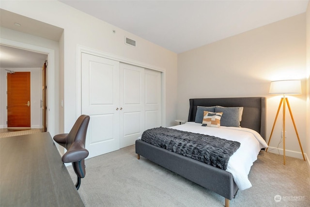 1920 4th Ave Unit 1802, Seattle, WA 98101 - carpeted bedroom featuring a closet and baseboards
