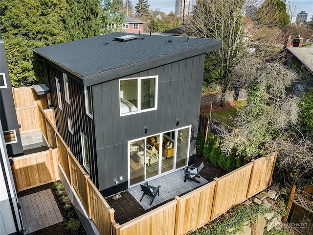 back of house featuring a patio area