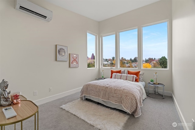 carpeted bedroom with a wall mounted air conditioner