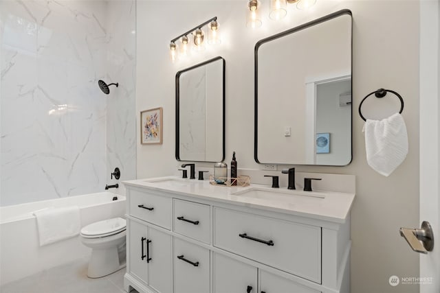 full bathroom featuring tile patterned flooring, vanity, toilet, and tiled shower / bath combo