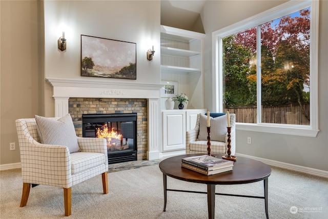 living area featuring light carpet and lofted ceiling