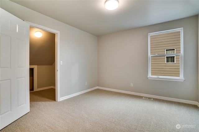 view of carpeted spare room