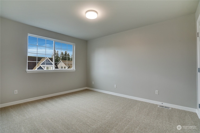 empty room with carpet floors