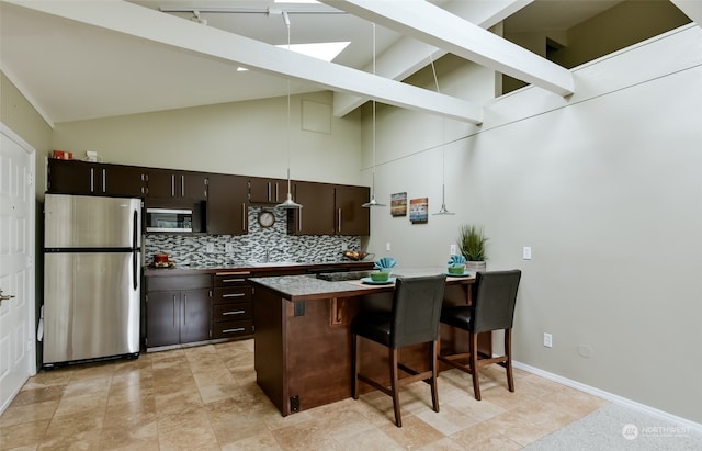 kitchen featuring a kitchen bar, appliances with stainless steel finishes, dark brown cabinetry, high vaulted ceiling, and beamed ceiling