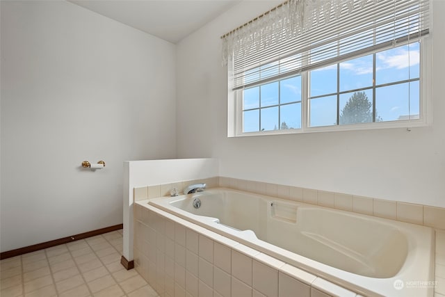 bathroom with tiled tub