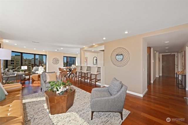 living room featuring dark hardwood / wood-style flooring