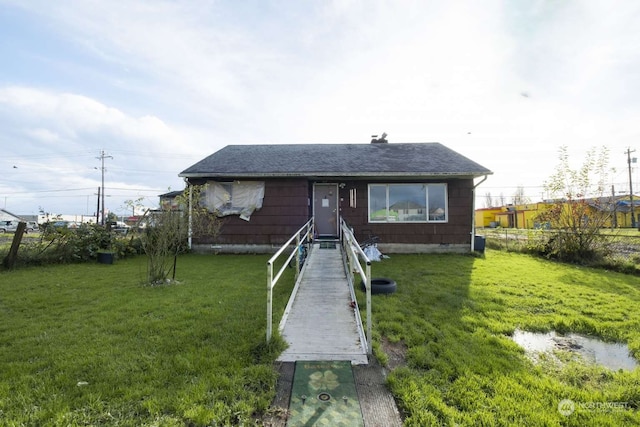 view of front of house with a front yard