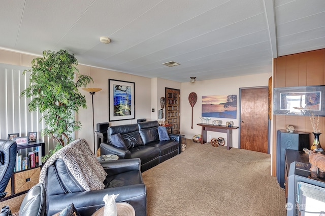 carpeted living room featuring a healthy amount of sunlight