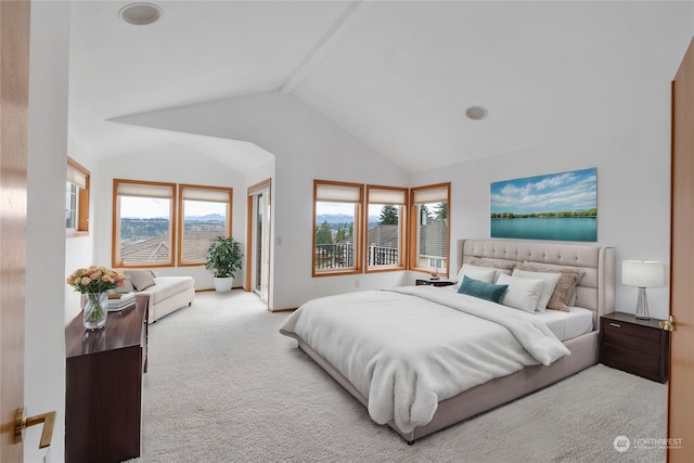 bedroom with beam ceiling, light colored carpet, and high vaulted ceiling