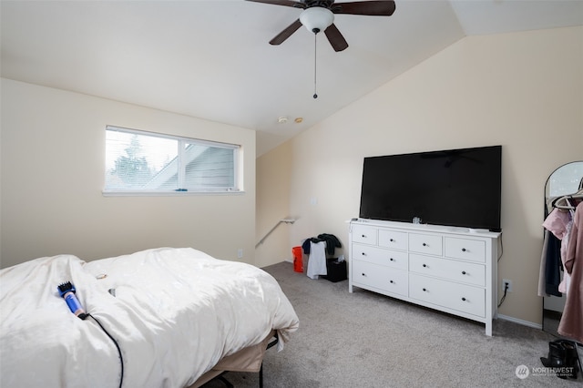 carpeted bedroom featuring ceiling fan and lofted ceiling