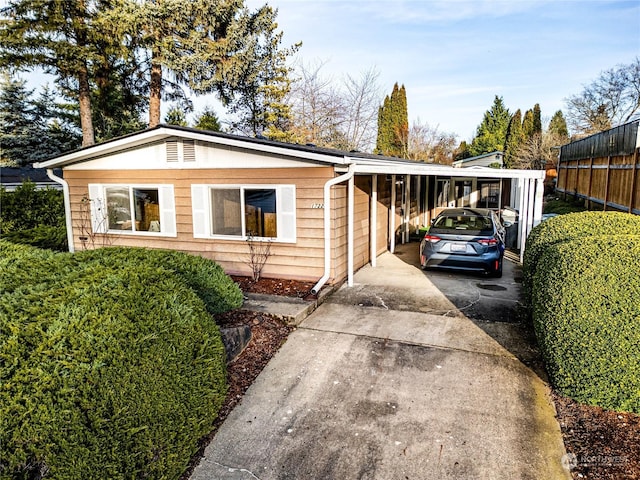 view of front of house featuring a carport