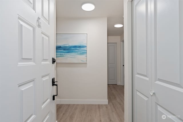 hall featuring light hardwood / wood-style flooring