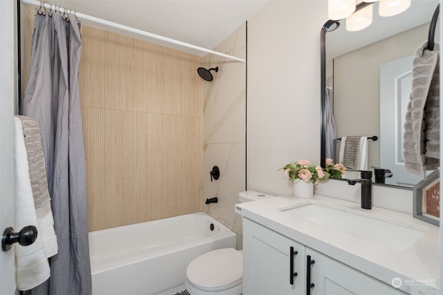 full bathroom featuring shower / bath combination with curtain, vanity, and toilet