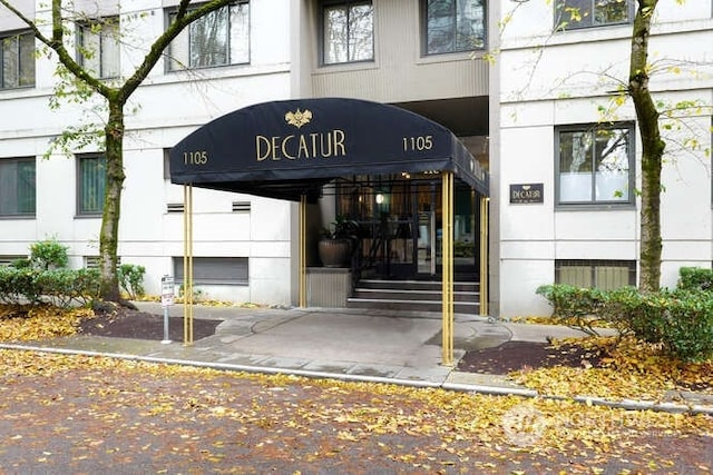 1105 Spring St Unit 701, Seattle, WA 98104 - property entrance featuring stucco siding