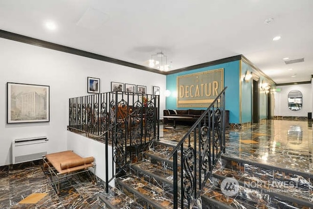 1105 Spring St Unit 701, Seattle, WA 98104 - staircase with ornamental molding, marble tiled flooring, and recessed lighting