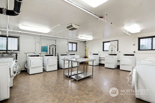 laundry room with plenty of natural light and independent washer and dryer