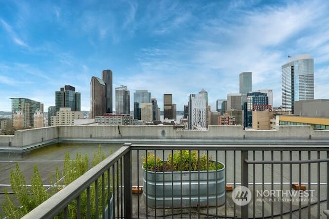1105 Spring St Unit 701, Seattle, WA 98104 - balcony with a skyline view