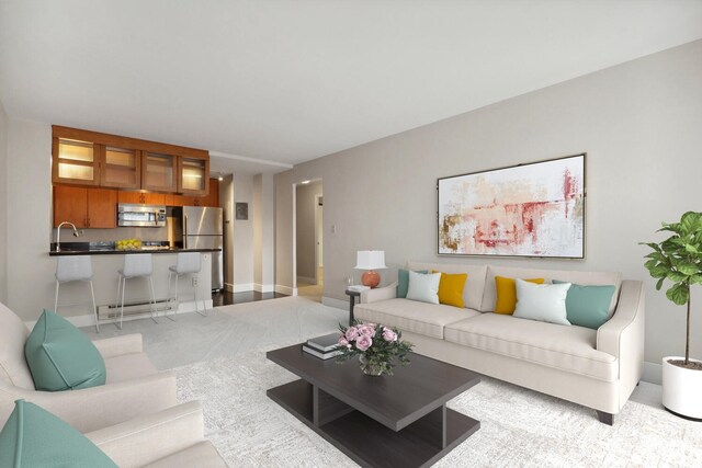 1105 Spring St Unit 701, Seattle, WA 98104 - living room featuring light carpet and baseboards