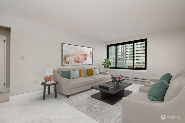 1105 Spring St Unit 701, Seattle, WA 98104 - carpeted living room featuring a baseboard radiator and baseboards