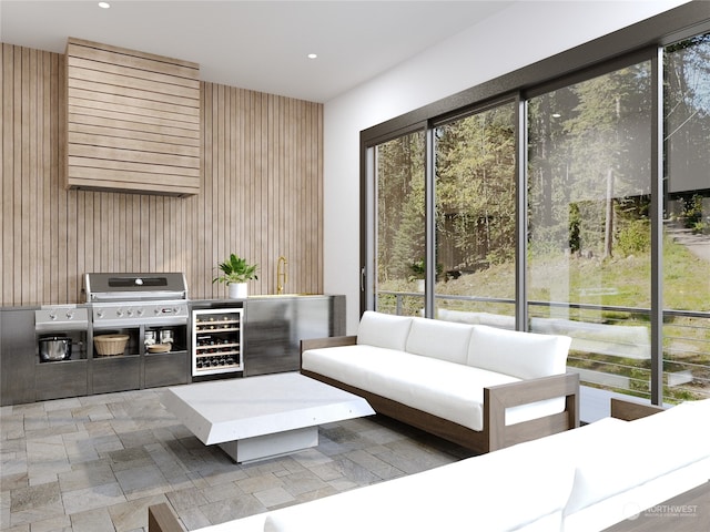 interior space featuring wood walls and beverage cooler