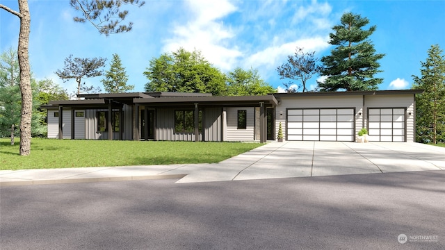 view of front of property with a garage and a front lawn