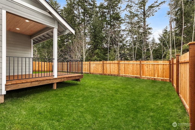 view of yard featuring a deck