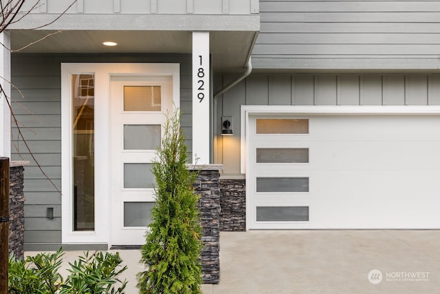 entrance to property featuring a garage