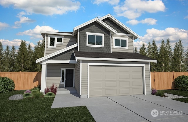 view of front of property featuring a front yard and a garage